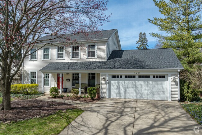 Single-family detached homes vary from midcentury split-levels to newer traditional homes.