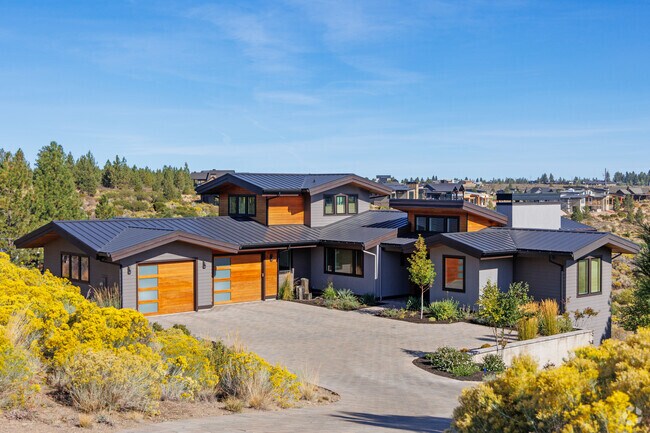 A singular split level home looks over the valley in Tetherow.