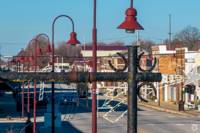 The rural and the city meet in downtown Gentry.