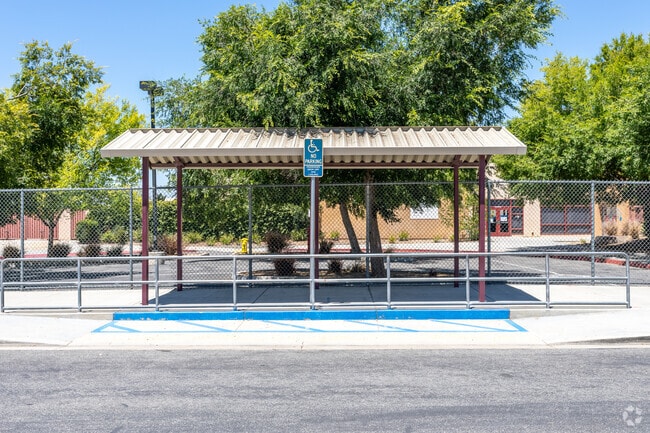 Sierra Lakes Elementary School features a covered school bus pickup area.