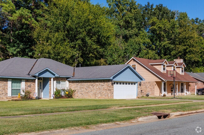 Ranch and traditional homes in the neighborhood.