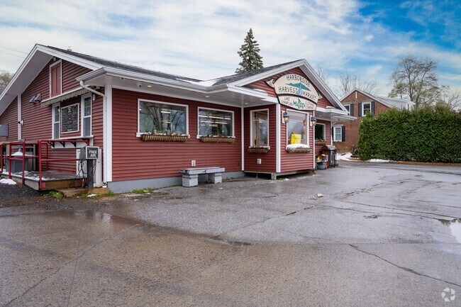 Harborside Harvest Market welcomes residents to shop.