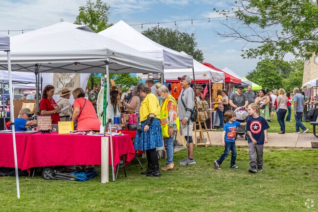 In the downtown greenspace, Rowlett's Farmers and Craft Market is a family event.