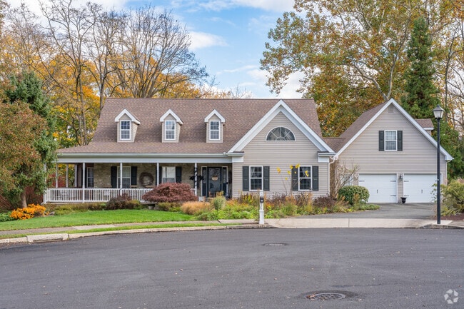 Modified Ranch homes with gable roofing and dormer windows are in Lower Macungie West.