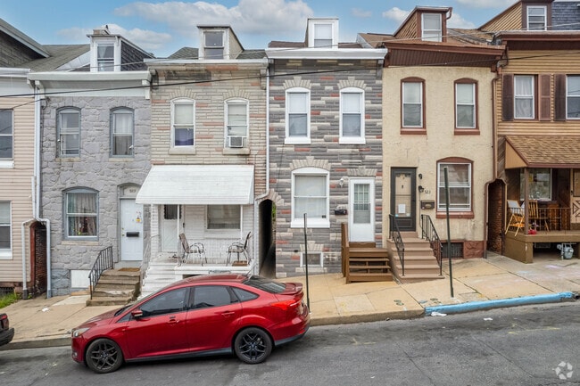 Variety of colonial style row homes in District 8.