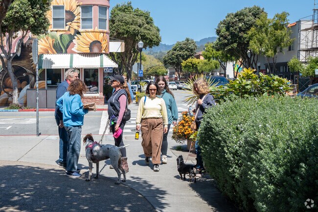Downtown Half Moon Bay comes alive with locals and visitors savoring its charm.