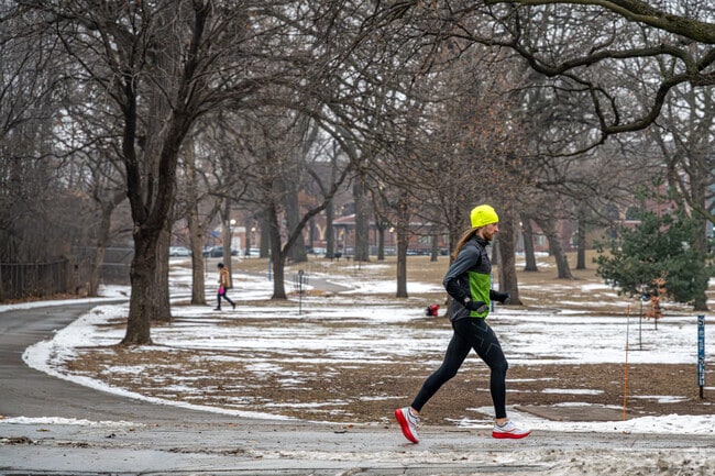 Joggers pass through Minnehaha Regional Park and Wabun Picnic Area,