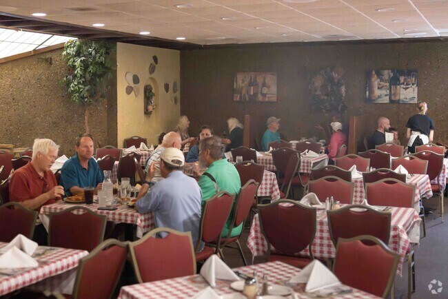 Stella’s Casa Capri has an old-school feel, with checkered tablecloths and a fountain inside.