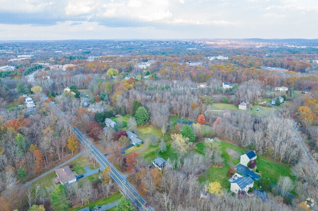 Classic colonials and forested lots define Far West Andover living.