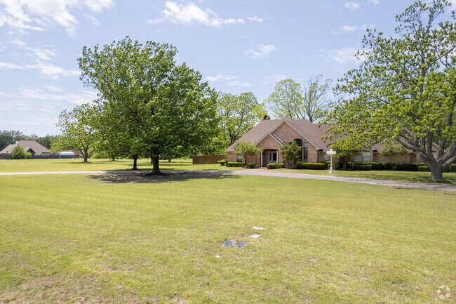 Spacious and stylish brick homes with an abundance of land in Commerce, TX.