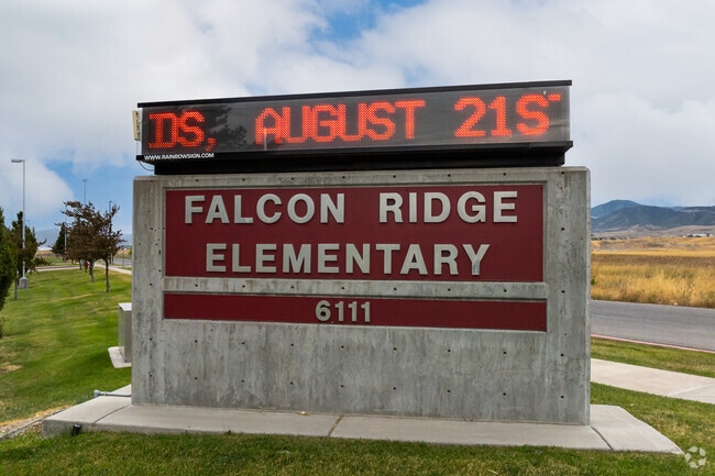 An electronic sign displays announcements at Falcon Ridge Elementary School.