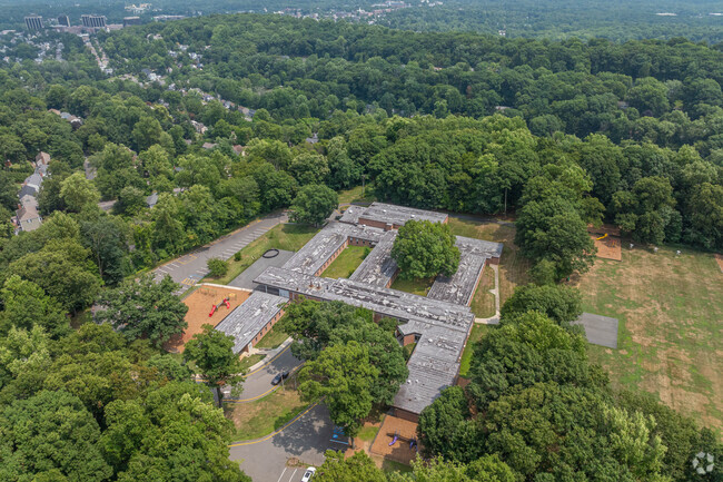 Hillcrest School has large green areas for sports and recreation.
