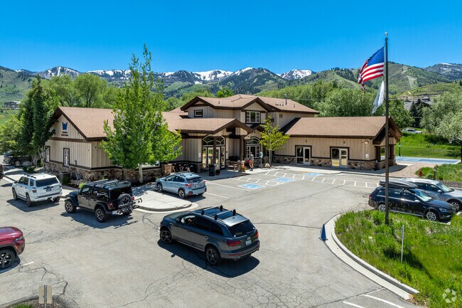 The Winter Sports School overlooks mountains and supports elite athletes.