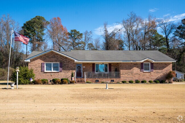 You can find classic brick ranch homes in Micro, NC.