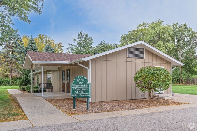 The Whispering Hills Community Center includes an acre of grounds for outdoor fun for residents.