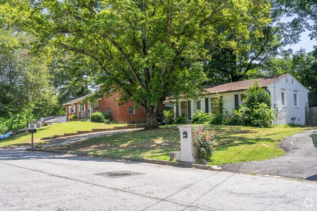 Ranch homes in Fairburn Heights reside on shaded lots and illustrate the neighborhood's timeless appeal.