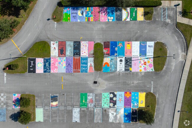 Students express their creativity on their parking spots at Father Lopez Catholic High School.