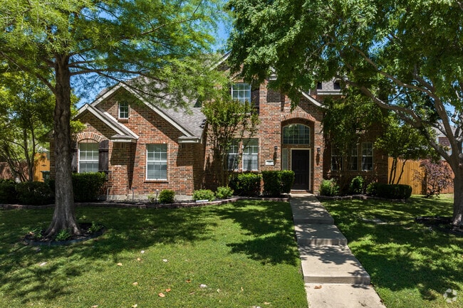 A multi-gabled, two-story home sits in the Daniel Crossing neighborhood of Murphy.