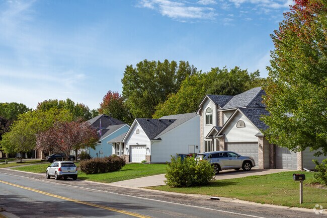 Kohlman Lake homes often feature spacious driveways and two-car garages.