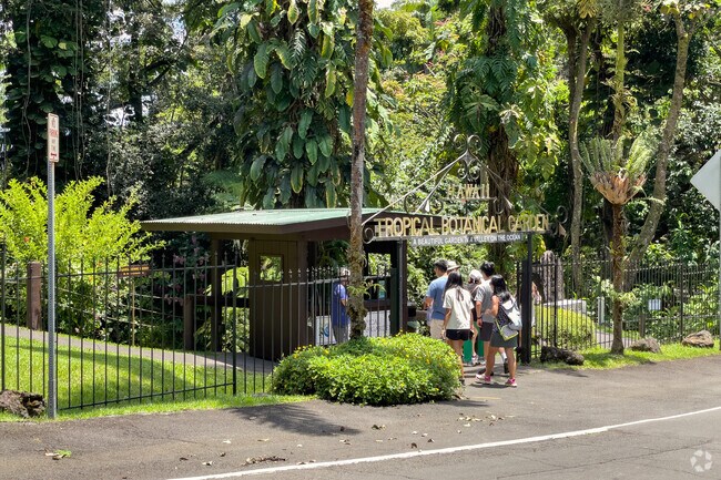 Visitors line up outside the entrance to Hawaii Tropical Botanical Garden.