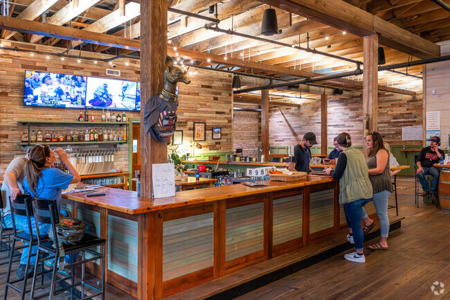 The owners of Pizza Grocery in Corinth transformed a historic 1920s warehouse into a stunning space with a rustic ambiance.