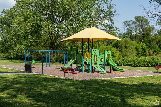 The Jack Frazier Memorial Tot Lot has a playground and a large open field in Darby.