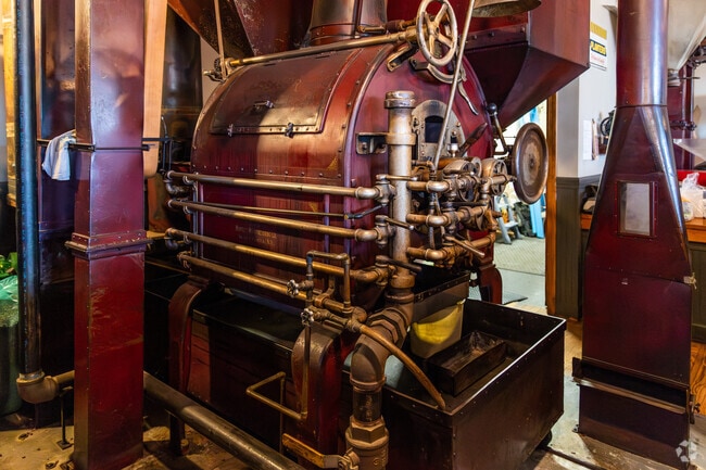 The roaster at Griggs Coffee & Peanuts draws regulars from nearby towns.