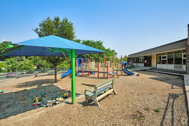 The enclosed play area at Allen Elementary offers a safe space for younger kids.