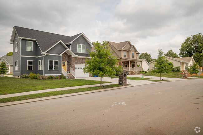Larger homes find purchase among the cottage and rancher dominated streets of Woodmore.