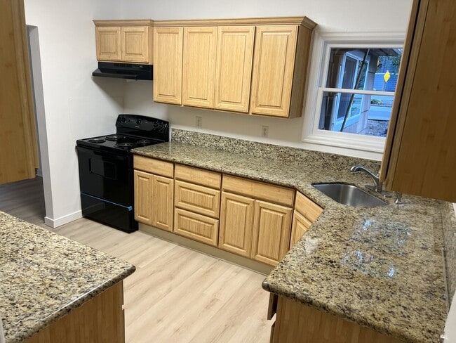 kitchen, back to driveway entrance