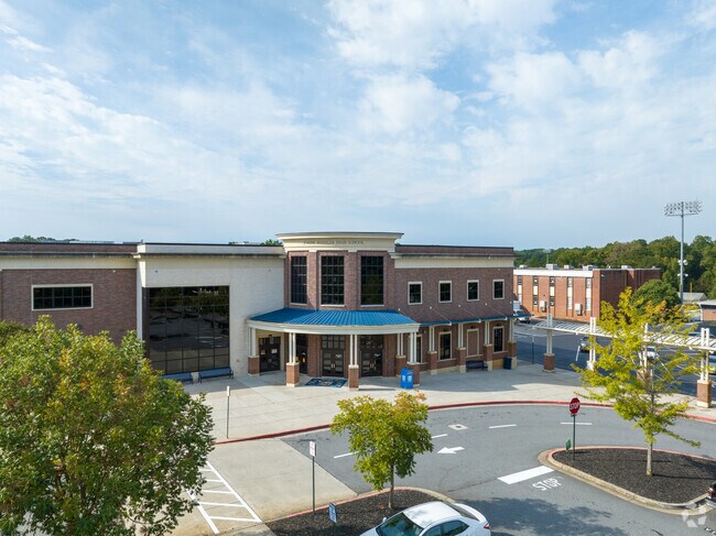 Wheeler High School has a reading proficiency of 54%.