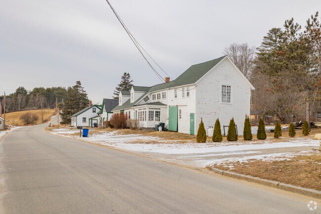 Rows of homes in Chichester showcase classic New England architecture with timeless charm.