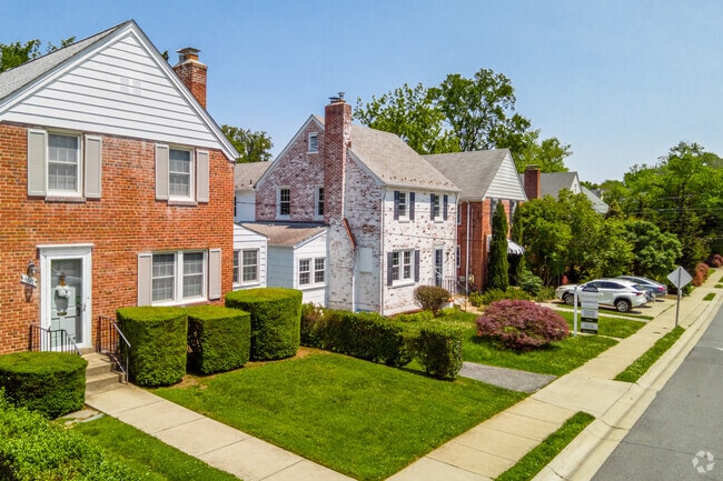 Large Modern Colonial homes line the quiet neighborhood streets of W Chevy Chase Heights.