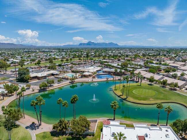 The Fountain of the Sun community surrounded by water.