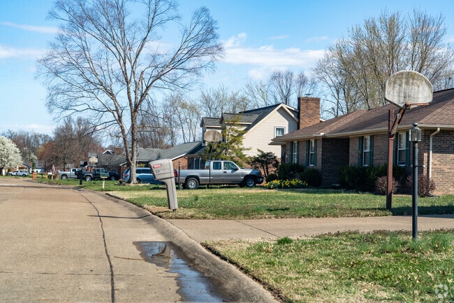 Homes are often equipped with large well landscaped lawns and attached garages.