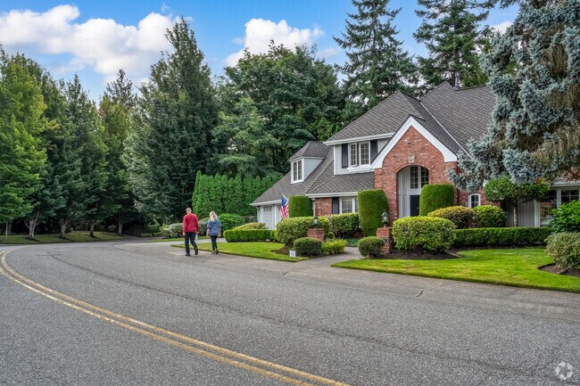 Wind and Tide residents walk amongst a variety of homes.