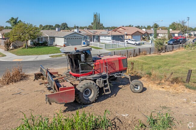 Productive farmland rests against the edges of South Merced's residential streets.