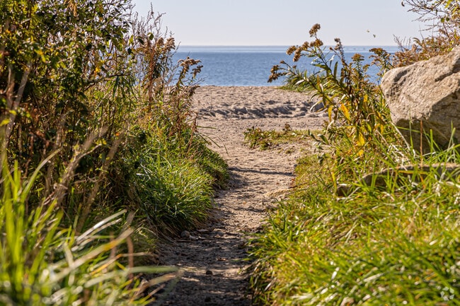 Stroll from quiet residential streets to the waterfront along Pope Beach.