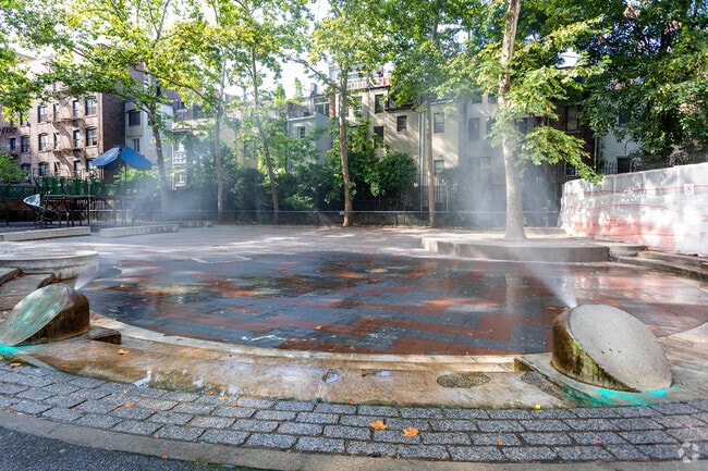 PS 166 Richard Rogers School has sprinklers for the students to run through.