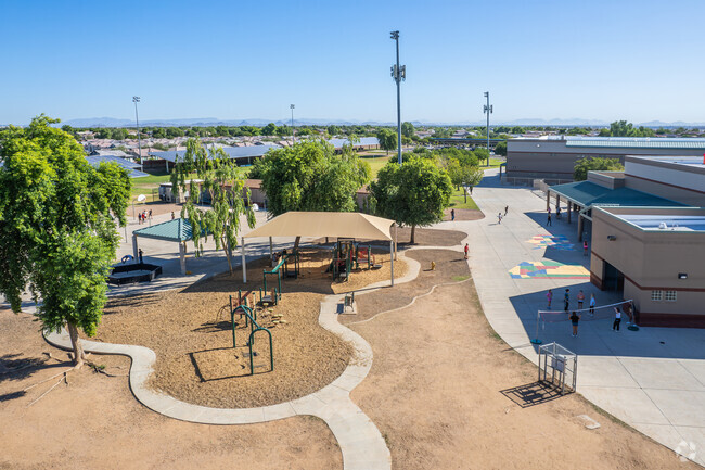 Exploring multiple playgrounds at Countryside Elementary School in Surprise.