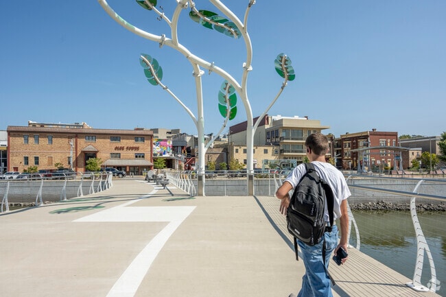 There are several bridges crossing the Rock River in Janesville, allowing for both pedestrian and vehicle traffic to easily commute.