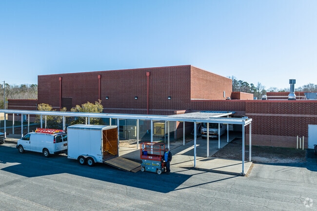 Clemmons Middle School offers a covered walkway for drop-offs and pick-ups.