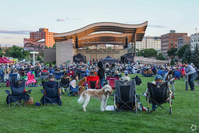 Neighbors in Norton Tract love the free concerts in the summer at Levitt at the Falls.
