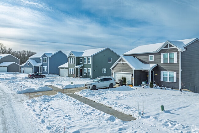 Two-story homes in Caledonia Township combine modern design with rural charm.