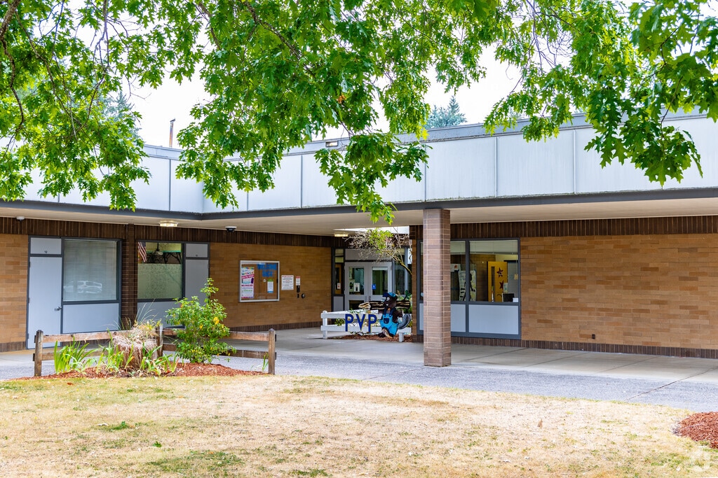 Pleasant Valley Primary School entrance and Beaver welcome kids to school.