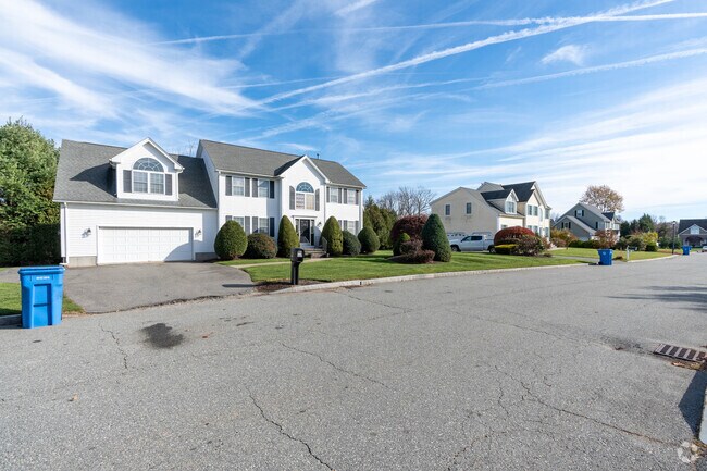 A row of colonial homes lines the streets of the Lime Rock neighborhood in Lincoln.