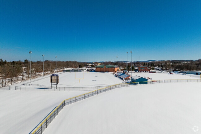 In Winter, the athletics field is covered with snow at Oneida Senior High School in Oneida.