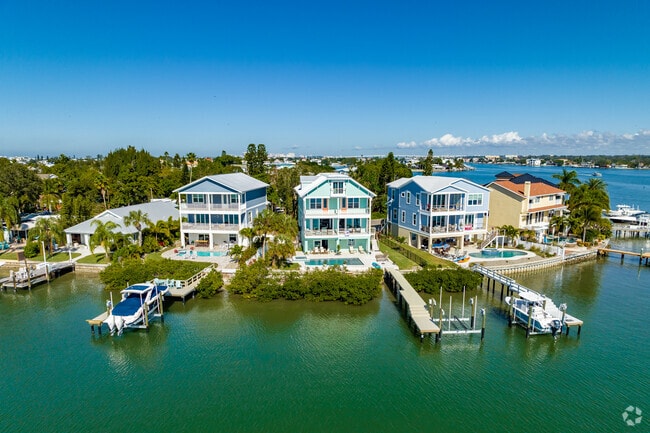 Grand homes in Indian Rocks Beach showcase varied architectural styles and premium waterfront access.