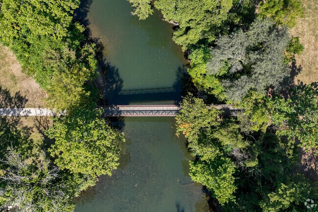 Aldo Simpson footbridge links Goshen Downtown Historic District to Rogers Park.