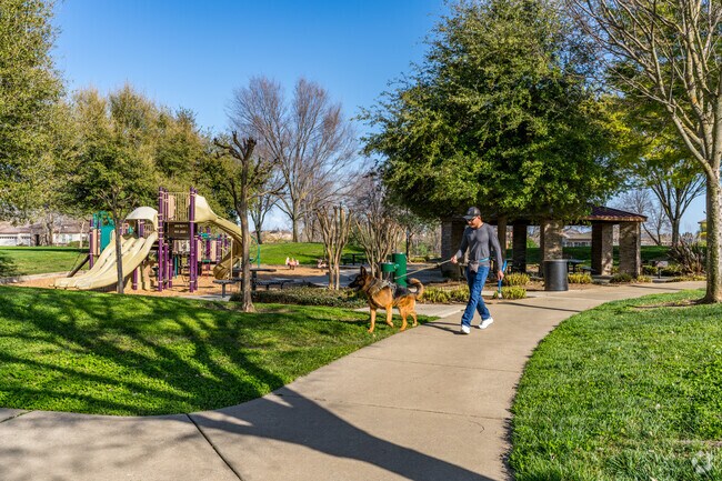 The pathways at Tuscany Park is great for walking your dog.